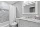 Bathroom featuring marble countertops, bathtub shower combo, and vanity lighting at 112 Blue Heron Dr, Summerville, SC 29485