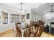 Cozy dining room with a wooden table, chairs, and natural light at 112 Blue Heron Dr, Summerville, SC 29485