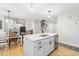 Open concept kitchen with island, stainless steel appliances, and dining area at 112 Blue Heron Dr, Summerville, SC 29485
