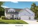 Charming single-story home featuring light blue siding, stone accents, and a convenient two-car garage at 1146 Darling St, Summerville, SC 29485