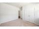 Bedroom with carpet flooring and double-door closet at 1251 Wading Point Blvd, Huger, SC 29450