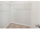 This walk-in closet features carpet flooring and shelving for storage at 1251 Wading Point Blvd, Huger, SC 29450