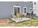 Outdoor patio area featuring outdoor seating and a grill, perfect for entertaining at 127 Rosefield Ct, Summerville, SC 29485