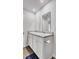 Bright bathroom featuring a double vanity with two sinks, framed mirrors, and updated fixtures at 127 Rosefield Ct, Summerville, SC 29485