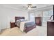 Bedroom featuring carpeted floors, ceiling fan, dresser, neutral walls and natural light at 127 Rosefield Ct, Summerville, SC 29485