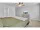 Neutral bedroom with carpet, ceiling fan, and bed, featuring a dresser with a television at 127 Rosefield Ct, Summerville, SC 29485