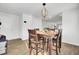 Inviting dining area with hardwood floors and modern light fixture at 127 Rosefield Ct, Summerville, SC 29485