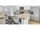 Spacious kitchen featuring stainless steel appliances, island with seating, and open layout at 127 Rosefield Ct, Summerville, SC 29485