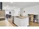 This open kitchen features modern appliances and an island at 127 Rosefield Ct, Summerville, SC 29485