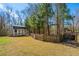 Large backyard with a storage shed and full perimeter wooden fence at 1273 Discovery Dr, Ladson, SC 29456