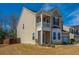 Lovely home with a charming porch, two-car garage, and beautiful landscaping in a suburban neighborhood at 1273 Discovery Dr, Ladson, SC 29456