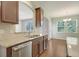 Modern kitchen featuring stainless steel appliances, granite countertops, and hardwood flooring at 1273 Discovery Dr, Ladson, SC 29456
