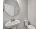 Elegant powder room featuring a modern sink, toilet and large mirror, providing a stylish and functional space at 130 Wappoo Trace Ln, Summerville, SC 29486