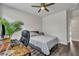 Cozy bedroom featuring a ceiling fan, desk, and comfortable bed, perfect for relaxation and productivity at 130 Wappoo Trace Ln, Summerville, SC 29486