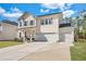 Attractive home featuring a three car garage, well-kept lawn and a cozy front porch at 130 Wappoo Trace Ln, Summerville, SC 29486