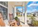 Inviting front porch with rocking chairs, offering a relaxing view of the neighborhood at 130 Wappoo Trace Ln, Summerville, SC 29486