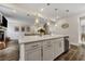 Spacious kitchen island with stainless steel appliances and seamless flow into the living room at 130 Wappoo Trace Ln, Summerville, SC 29486