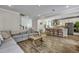 Open-concept layout showcasing the spacious living room and modern kitchen, great for entertaining at 130 Wappoo Trace Ln, Summerville, SC 29486