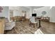 Open floor plan featuring office space, dining room and hardwood floors at 130 Wappoo Trace Ln, Summerville, SC 29486