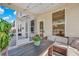 Inviting screened patio with comfortable wicker furniture, perfect for outdoor lounging and relaxation at 130 Wappoo Trace Ln, Summerville, SC 29486