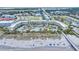 Breathtaking aerial view of beachside condos and pool, offering stunning coastal living and resort-style amenities at 1300 Ocean Blvd # 114 A, Isle of Palms, SC 29451