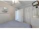 Comfortable bedroom with a full bed, ceiling fan, and closet at 1300 Ocean Blvd # 114 A, Isle of Palms, SC 29451
