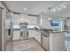 Modern kitchen with stainless steel appliances, granite countertops, and an open layout at 135 Pier View St # 203, Charleston, SC 29492