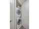 Convenient laundry closet with stacked washer and dryer maximizing space at 135 Pier View St # 203, Charleston, SC 29492