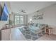 Bright living room features comfortable furniture, stylish decor, and ample natural light at 135 Pier View St # 203, Charleston, SC 29492