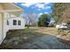 Backyard view of home with patio and grass at 1409 Main St, Bonneau, SC 29431