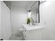 Bright bathroom vanity with a mirror and shower at 1409 Main St, Bonneau, SC 29431