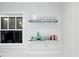 Kitchen decor featuring open shelves next to a window at 1409 Main St, Bonneau, SC 29431