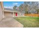 Spacious backyard with manicured lawn, fire pit, and picnic table perfect for entertaining at 143 Moon Dance Ln, Summerville, SC 29483