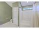 Well-lit bathroom showcases a shower-tub combo with a full white shower curtain at 143 Moon Dance Ln, Summerville, SC 29483