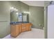 Bright bathroom boasts double vanity with spacious countertops and ample lighting at 143 Moon Dance Ln, Summerville, SC 29483