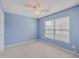 Comfortable bedroom featuring a ceiling fan and window at 143 Moon Dance Ln, Summerville, SC 29483