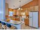 Bright eat-in kitchen showcasing lots of cabinets, a peninsula, and modern appliances, creating a perfect cooking space at 143 Moon Dance Ln, Summerville, SC 29483