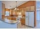 Bright eat-in kitchen showcasing lots of cabinets, a peninsula, and modern appliances, creating a perfect cooking space at 143 Moon Dance Ln, Summerville, SC 29483