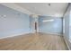 Spacious living room features vaulted ceilings, hardwood floors, and ample natural light at 143 Moon Dance Ln, Summerville, SC 29483