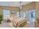 Beautiful main bedroom featuring a vaulted ceiling, a ceiling fan, and bright, light-filled windows for peaceful relaxation at 143 Moon Dance Ln, Summerville, SC 29483