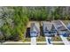 A spacious home with a long driveway, mature landscaping, and a private backyard, perfect for suburban living at 162 Cherry Grv Dr, Summerville, SC 29483