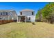 A spacious backyard features a screened porch, fire pit, and a play structure, perfect for Gathering gatherings at 162 Cherry Grv Dr, Summerville, SC 29483