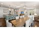Open-concept layout featuring a spacious dining area, kitchen, and comfortable living space at 162 Cherry Grv Dr, Summerville, SC 29483
