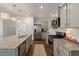Modern kitchen with stainless steel appliances, granite countertops, and a central island at 162 Cherry Grv Dr, Summerville, SC 29483