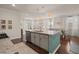 Bright kitchen with a central island, stainless appliances, and adjacent dining and living areas at 162 Cherry Grv Dr, Summerville, SC 29483
