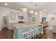 Spacious kitchen island with seating, stainless appliances, and modern pendant lighting at 162 Cherry Grv Dr, Summerville, SC 29483