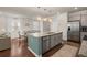 Open-concept kitchen featuring stainless steel appliances and a large island at 162 Cherry Grv Dr, Summerville, SC 29483