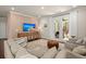 Comfortable living room with plush seating and access to outdoor patio at 162 Cherry Grv Dr, Summerville, SC 29483