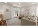Bright living room offering plush seating and seamless access to an outdoor area at 162 Cherry Grv Dr, Summerville, SC 29483