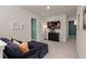 Cozy living room with a plush blue couch, TV, and stylish decor at 162 Cherry Grv Dr, Summerville, SC 29483